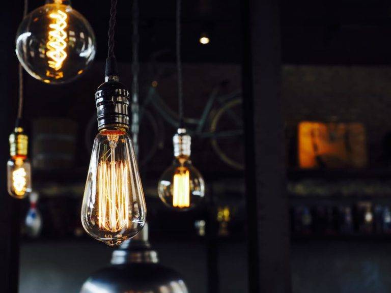 Light Bulbs Illuminated With A Black Background